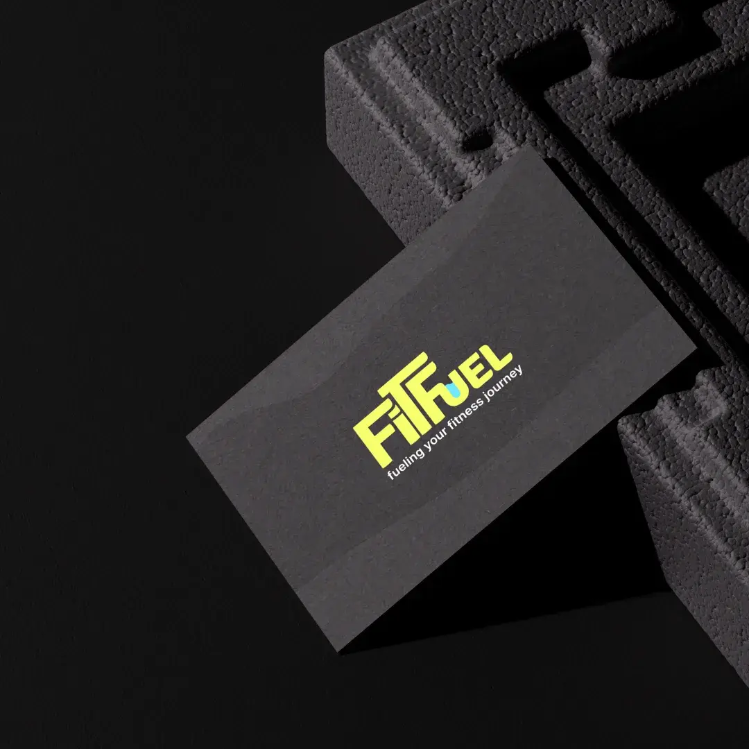 A dark grey business card with the lime wordmark, on black foam