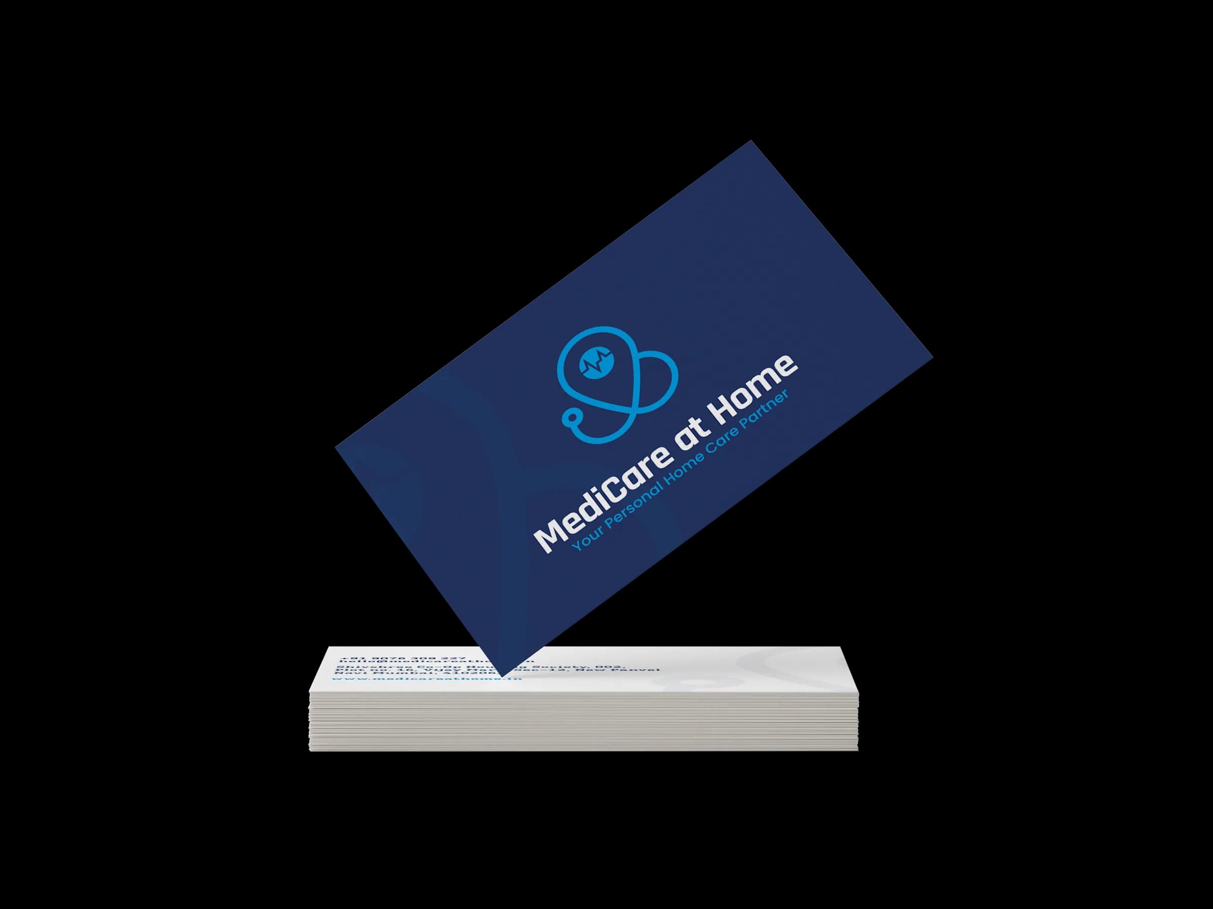A business card propped on a stack of cards