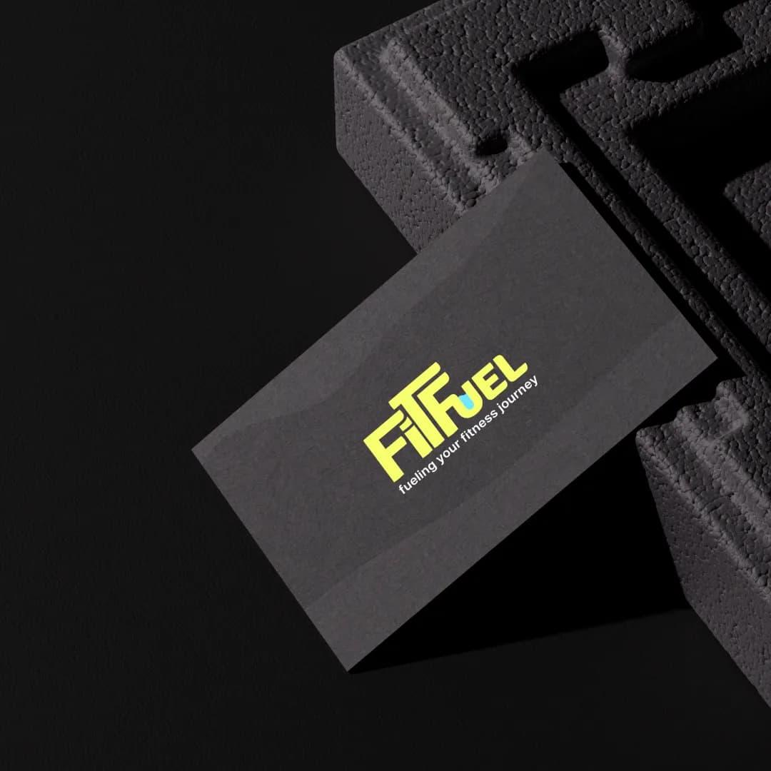 A dark grey business card with the lime wordmark, on black foam