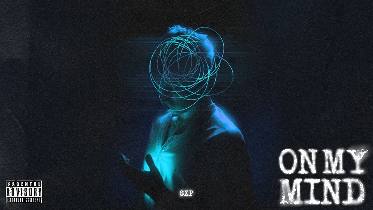 Video thumbnail: the figure centred in night-navy, ON MY MIND large at the bottom right and a Parental Advisory mark at the bottom left.